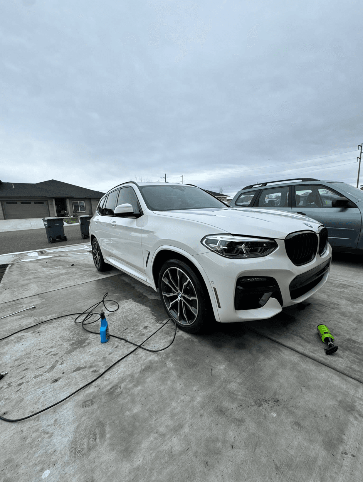 White BMW X3 finished after a mobile exterior detail in an Omaha driveway